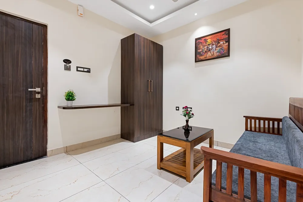 Spacious Business Suite Bedding — Veera Residency
