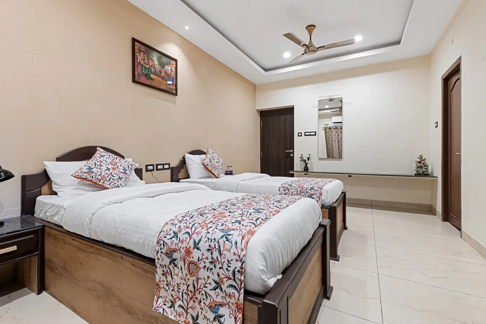 Premium Business Suite Bedroom Setup — Veera Residency