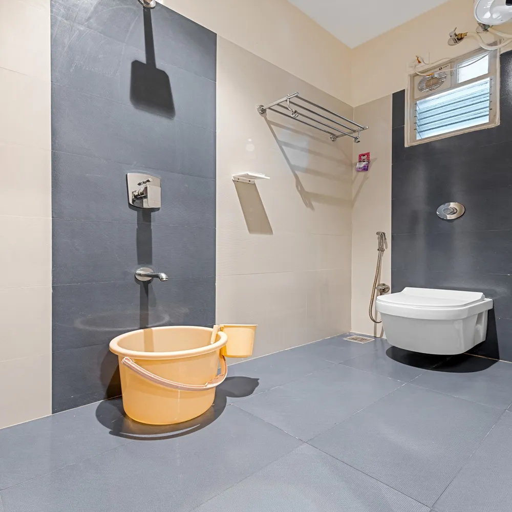 Deluxe Plus Room Wardrobe & Amenities — Veera Residency