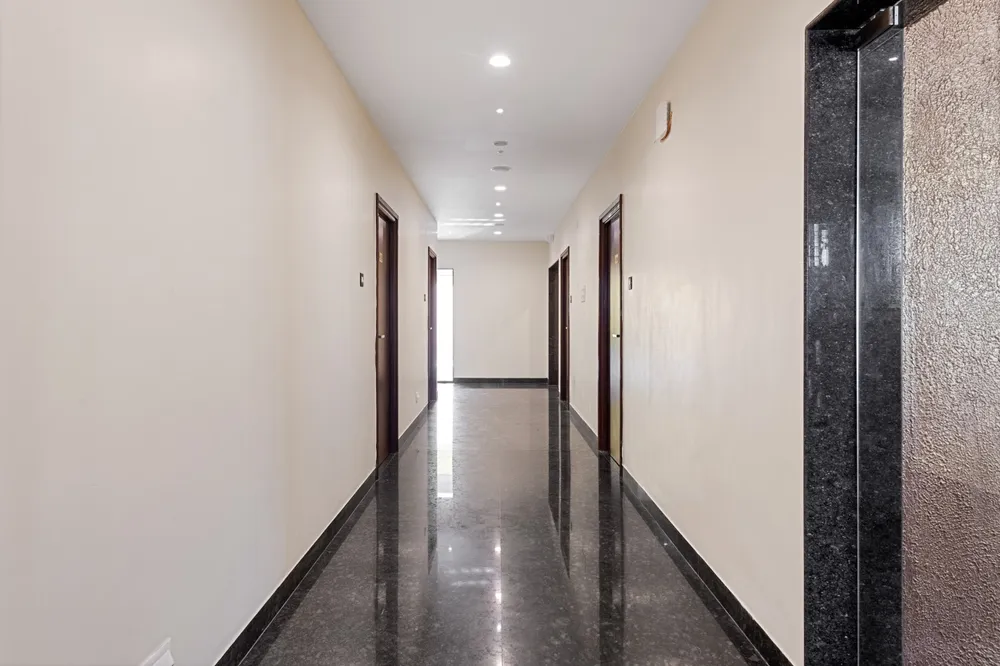 Polished Corridors on Upper Floors — Veera Residency