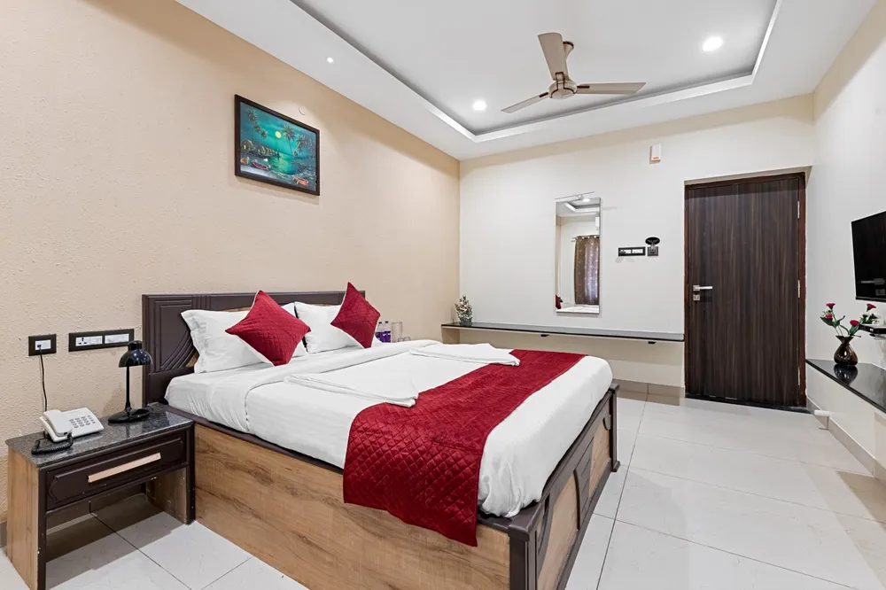 Budget-Friendly Standard Room Bedroom — Veera Residency